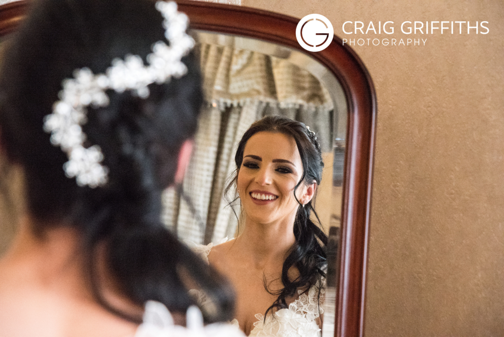 Brides reflection in a mirror